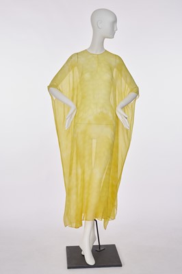 Lot 86 - A Halston dappled yellow chiffon caftan, circa 1975