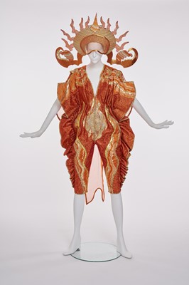 Lot 91 - A rare and elaborate Kaisik Wong orange jumpsuit ensemble, 1970s