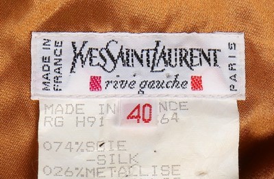 Lot 304 - An Yves Saint Laurent sari-style gold lamé...