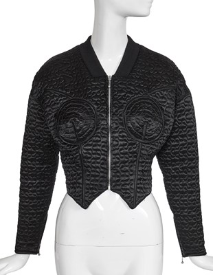 Lot 385 - A Jean Paul Gaultier black polyamide quilted bomber jacket, circa 1985