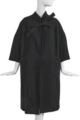 Lot 464 - A Pierre Balmain haute couture black wool coat, circa 1960