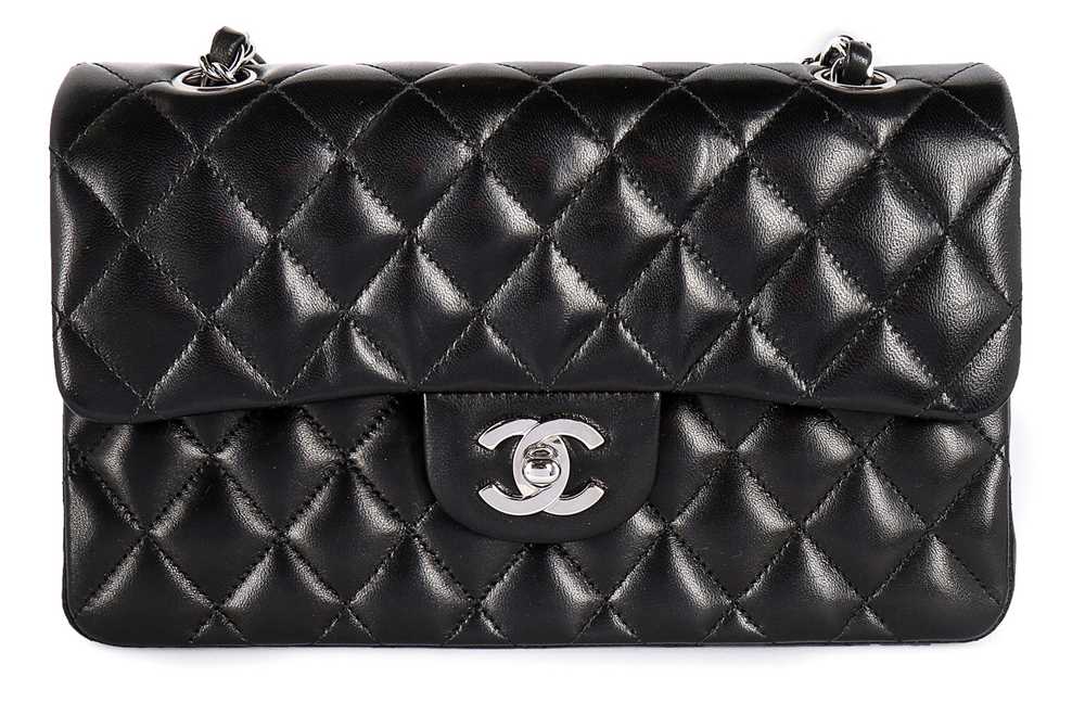 Lot 2 - A Chanel black quilted leather 2.55 bag, 1990s,...