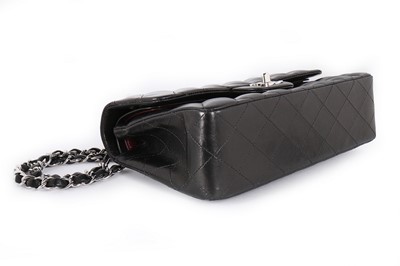 Lot 2 - A Chanel black quilted leather 2.55 bag, 1990s,...