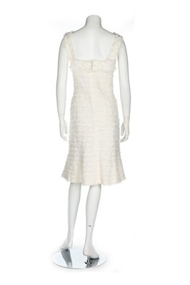 Lot 300 - A Chanel white tweed dress, 2005, labelled and...
