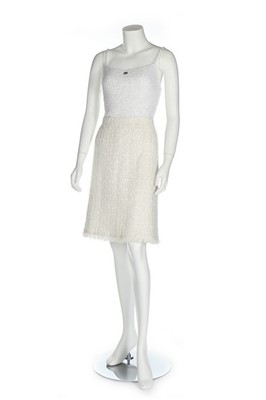 Lot 300 - A Chanel white tweed dress, 2005, labelled and...