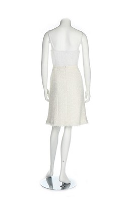 Lot 300 - A Chanel white tweed dress, 2005, labelled and...