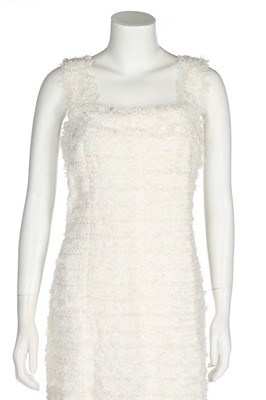 Lot 300 - A Chanel white tweed dress, 2005, labelled and...