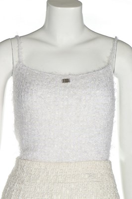 Lot 300 - A Chanel white tweed dress, 2005, labelled and...