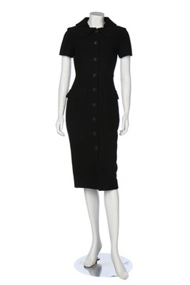 Lot 132 - A Chanel black bouclé wool dress and jacket...