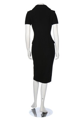 Lot 132 - A Chanel black bouclé wool dress and jacket...