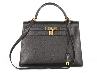 Lot 9 - An Hermès black Fjord leather Kelly bag, 1995,...