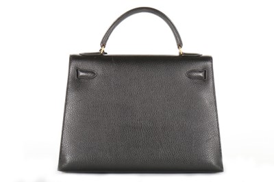 Lot 9 - An Hermès black Fjord leather Kelly bag, 1995,...
