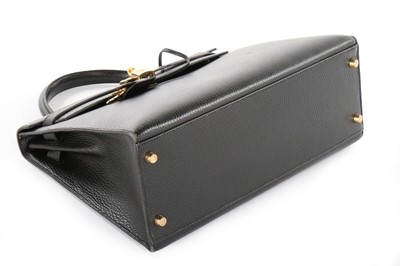 Lot 9 - An Hermès black Fjord leather Kelly bag, 1995,...