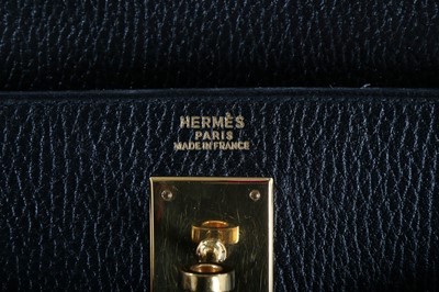 Lot 9 - An Hermès black Fjord leather Kelly bag, 1995,...