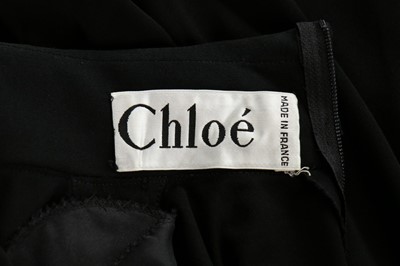 Lot 154 - A Chloé black jersey evening dress, 1983,...