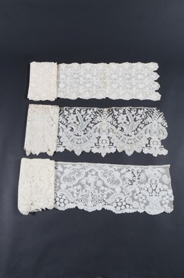 Lot 401 - Three 18th century style Brabant flounces,...