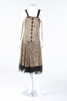 Lot 308 - A draped and swagged black satin evening cape,...
