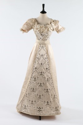 Lot 317 - A richly embroidered satin bridal or...