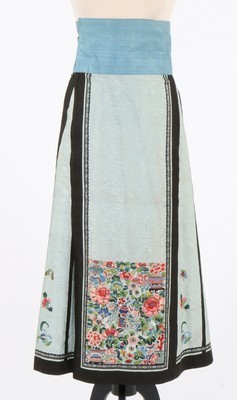 Lot 482 - A pale blue gauze embroidered summer skirt,...