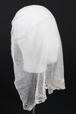 Lot 418 - A cap of early looped machine net with Alencon...