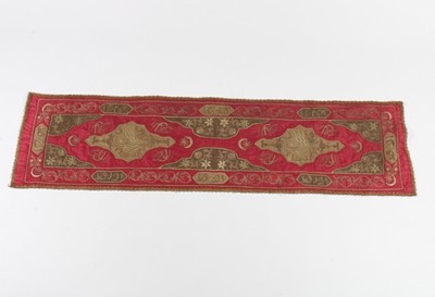 Lot 444 - A runner of embroidered crimson and sage green...