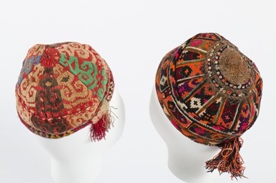 Lot 464 - A large group of men's skull caps, Central...