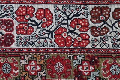 Lot 429 - An embroidered table carpet, dated by the...