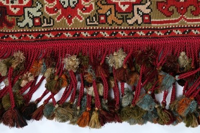Lot 429 - An embroidered table carpet, dated by the...