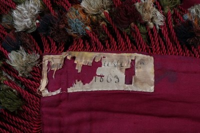 Lot 429 - An embroidered table carpet, dated by the...